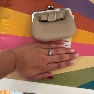 Elegant Cream Clutch with Bow Accent